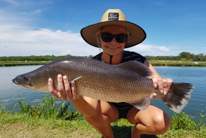 hook-a-barra-girl-holding-fish