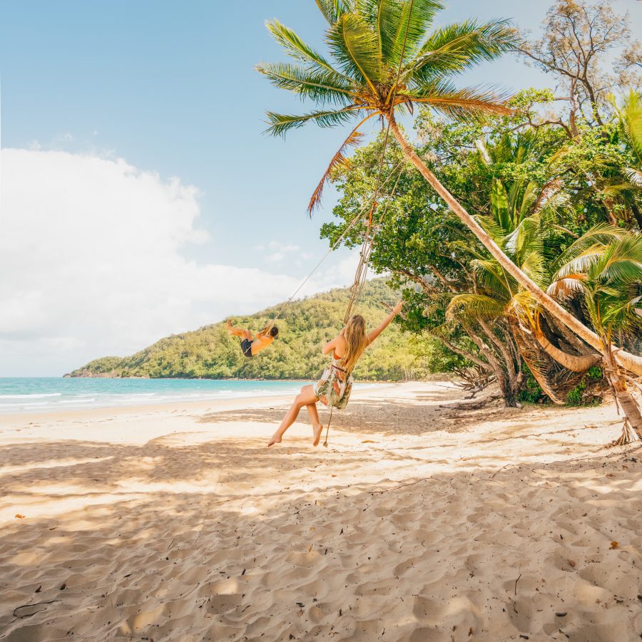 /images/_squareLarge/Girl-on-a-swing-on-rainforest-beach-138572-2.jpg