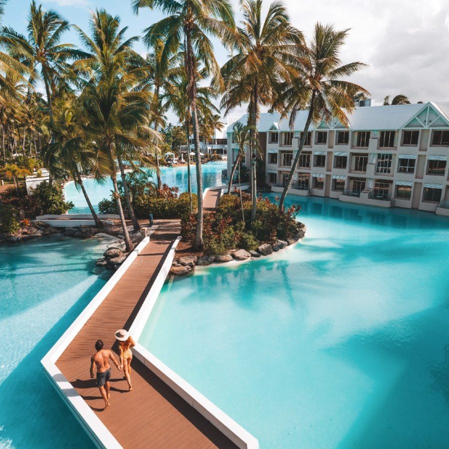 /images/_squareLarge/couple_walking_sheraton_luxury_pool.jpg